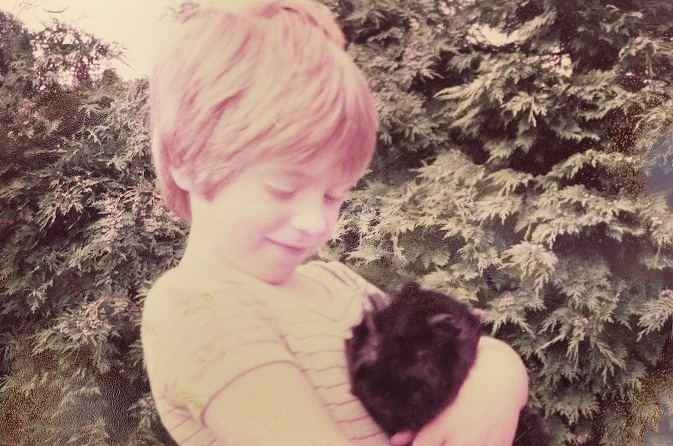 Photo of Remy Sharp as a young boy with his guinea pig