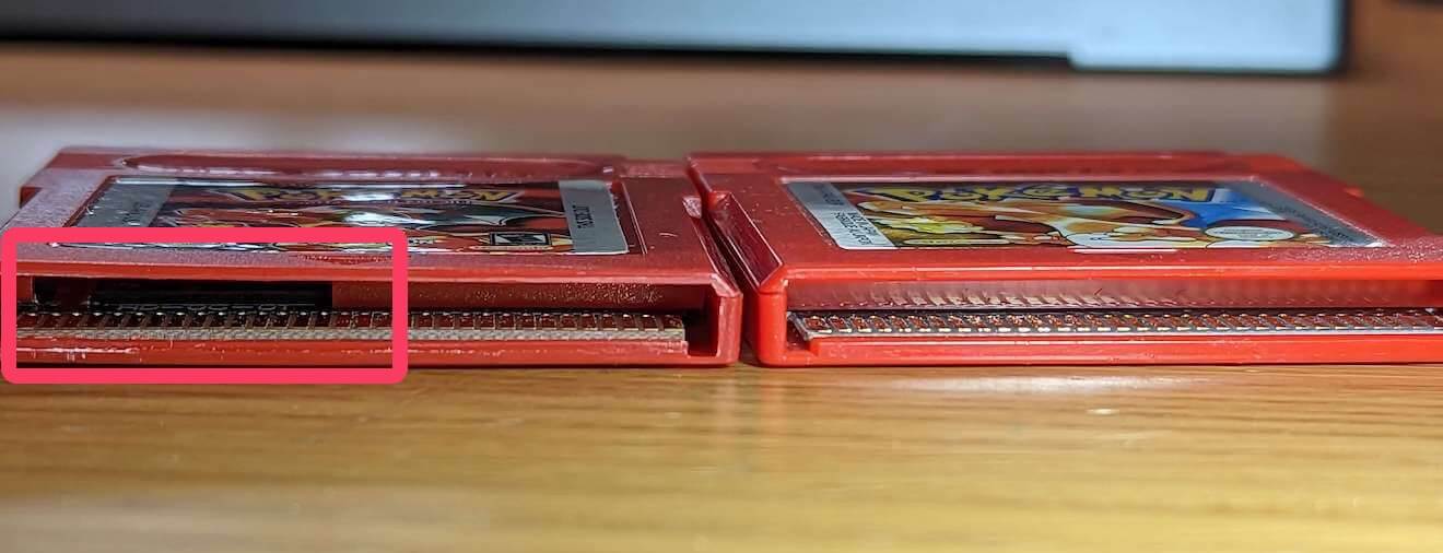 Comparison bottom of two gameboy carts